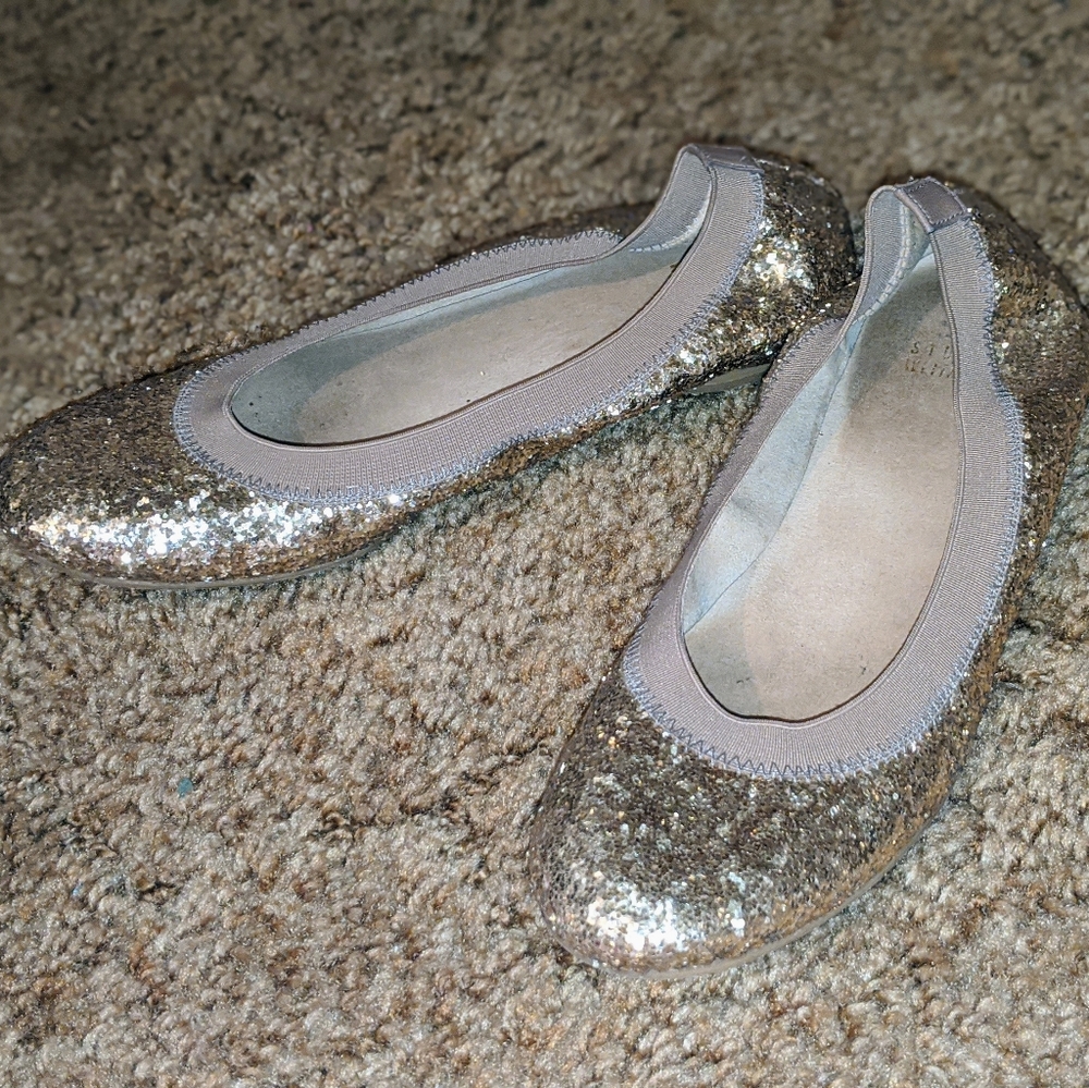 Stuart Weitzman gold sparkly Lastikon flats